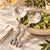A sculptural two-piece salad serving set from Arthur Court’s Safari Collection, featuring a pair of dimensional spotted...