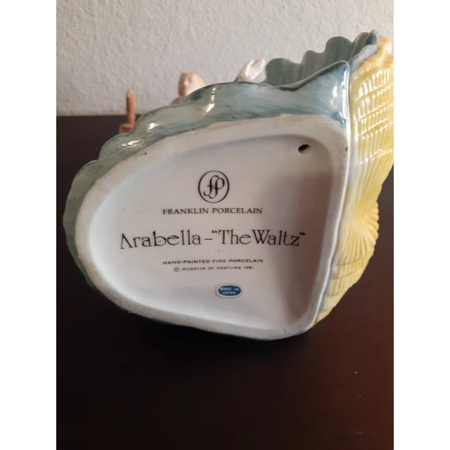 This is Franklin Mint Fine Porcelain 8" handpainted Figurine "Arabella The Waltz" Procured at an auction BOX 6