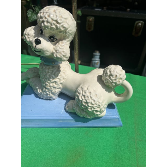 Up for consideration is a beautiful vintage ceramic sitting poodle table lamp. This would look lovely in your home, and it...