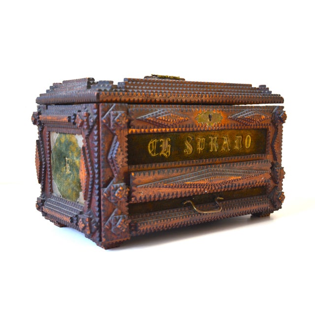 An amazing vintage handmade Tramp Art wooden box with lower drawer circa early 1900s. This piece is a fine quality work...