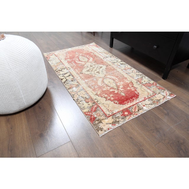 Vintage Hand-Knotted area rug is a semi-antique vintage area rug. The '70s Eastern region of Anatolian's unique rug is...