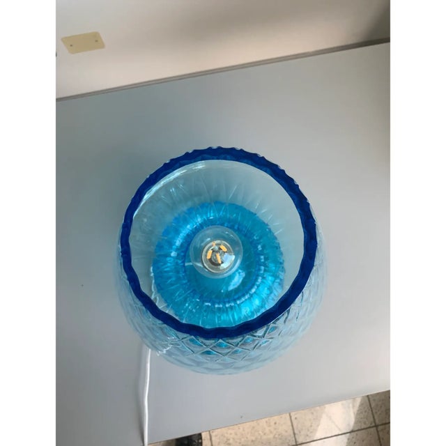 Lamp in light-blue Murano glass with particular diamond processing "ballotton". Very elegant and effective. Very lively...