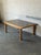 This striking coffee table features an inset ceramic tile top with intricate patterns and sturdy turned legs. Crafted in...