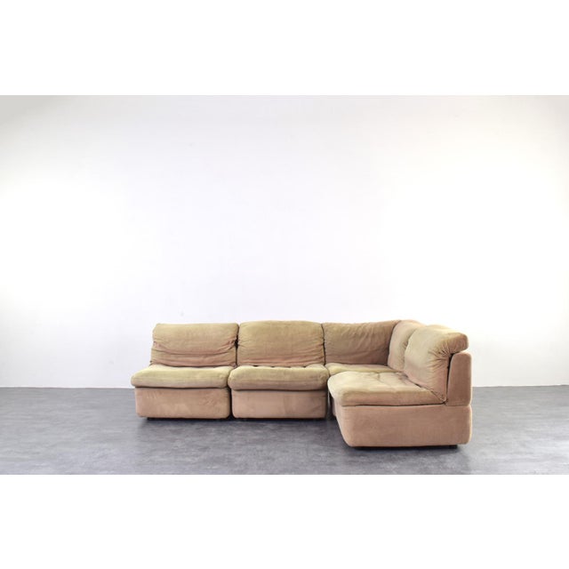 This modular sofa in green-beige color was manufactured in Germany in the 1970s by Rolf Benz. The sofa is in good,...
