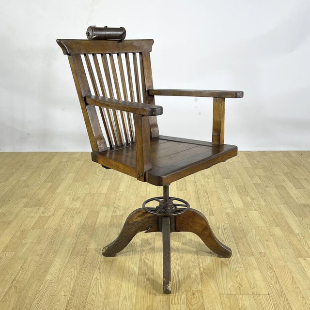 This rare swivel barber's chair from the 1930s is an iconic piece of industrial modernism, perfect for those seeking a...