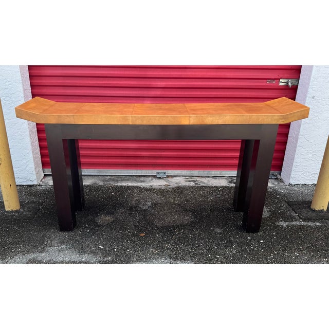 A striking and refined piece of furniture blending Eastern and Western elements this Asian inspired design table has the...