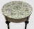 Elevate your space with this handmade round side table crafted from solid wood and fully inlaid with natural mother of...