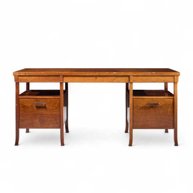 Bill Sofield for Baker Furniture Bridger Walnut Library Desk This desk measures: 68 wide x 26 deep x 30 high, with a chair...