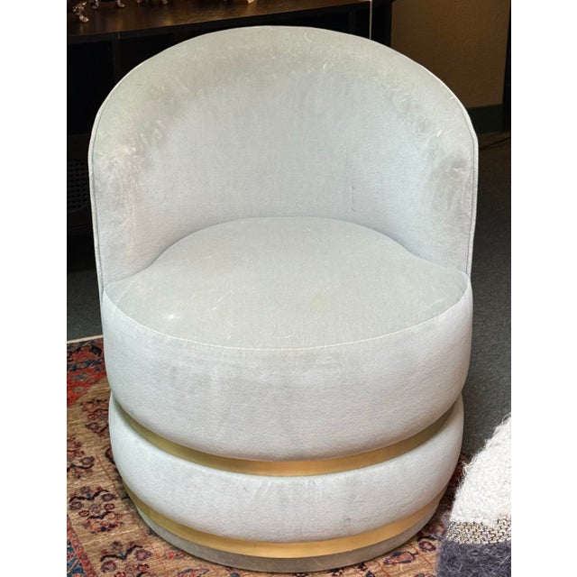 Design Plus Gallery presents a Gray Velvet Swivel Chair with Barrel Back. The style is this soft, sophisticated and...
