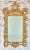 LaBarge Chinese Chippendale–style Chinoiserie wall mirror, crafted in Italy during the 20th century. With its soaring...