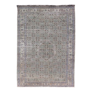 Vintage Persian Tabriz Rug With Floral Medallion in Earthy Tones With Brown For Sale