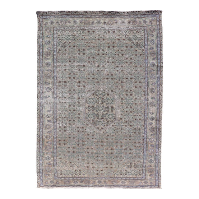 Vintage Persian Tabriz Rug With Floral Medallion in Earthy Tones With Brown For Sale