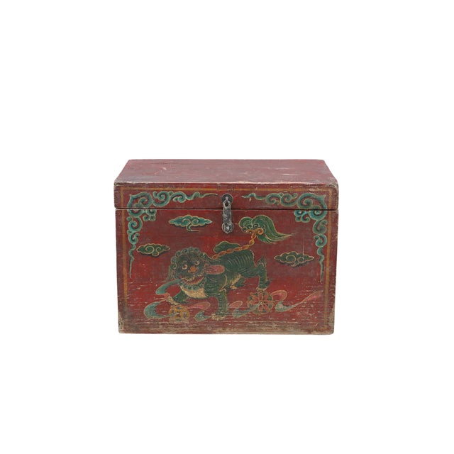 Vintage Chinese Painted Chest, in red paint and the front decorated with a protective foo dog and clouds. 12Hx17.5x17.5