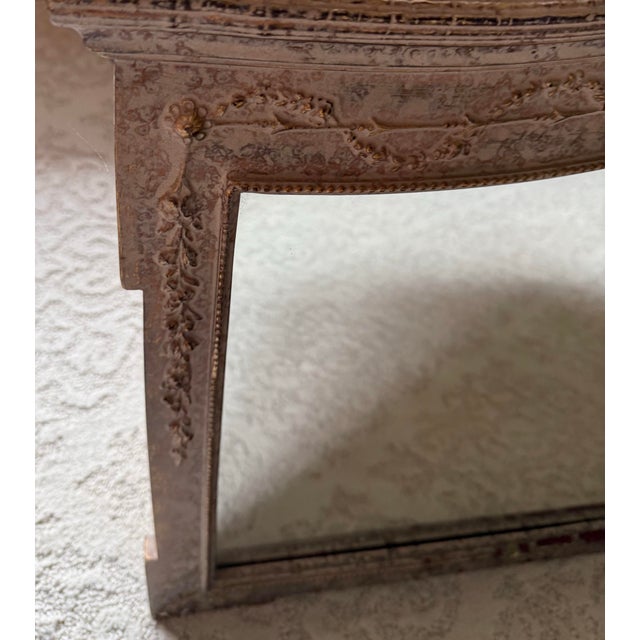 Elegant large carved wood wall mirror with a beautiful arched silhouette and richly detailed frame. The ornate design...