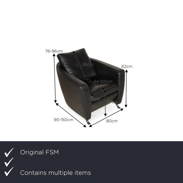 The Sesam armchair set from FSM is covered in black genuine leather and stands on metal feet. It is characterized by its...