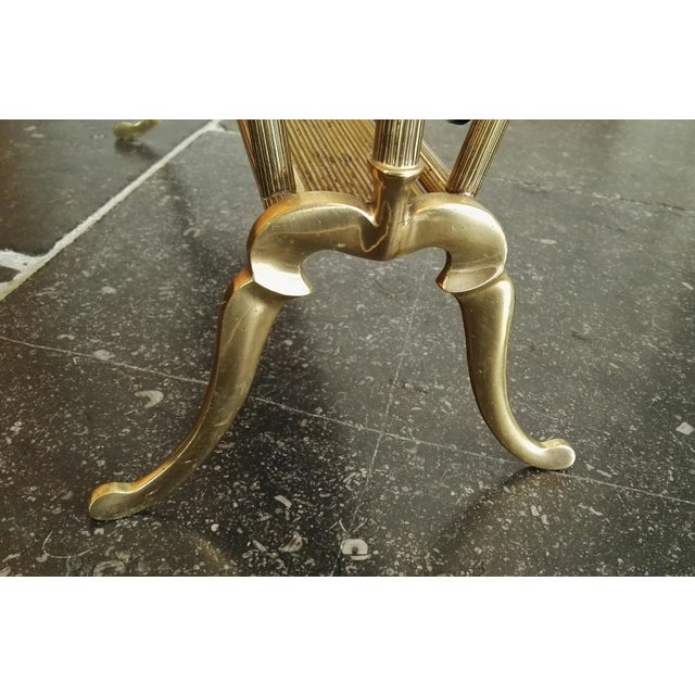 A magazine stand / magazine rack from Maison Bagués. The stand is in a very good original vintage condition. Both glass...