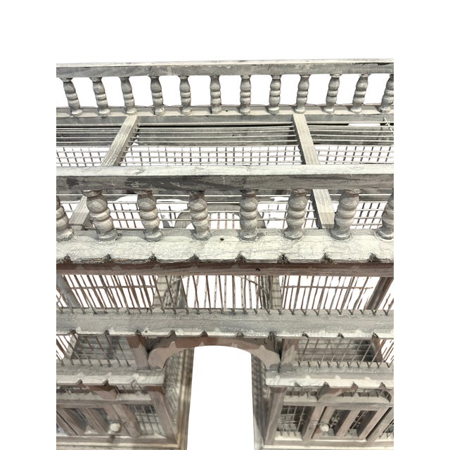 A fine vintage bird cage in old white over gray paint, styled after the Arc De Thiomphe. Wooden & wire construction with...
