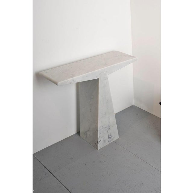 Alcm console in bianco carrara marble by bufalini design dimensions: d 78 x w 30 x h 75 cm. Materials: bianco carrara...