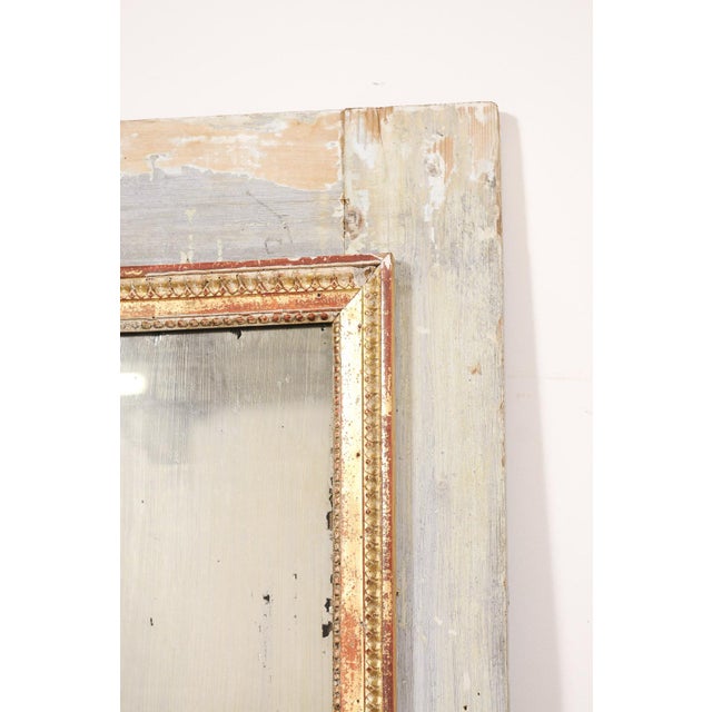Bring timeless French elegance into your home with this exquisite 18th-century mirror, showcasing a beautifully aged...