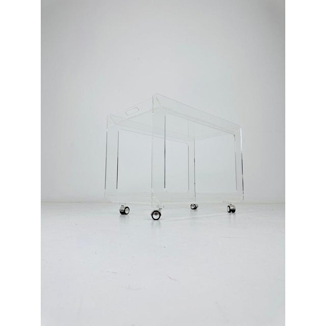 Italian Space Age acrylic trolley, 1970s Very clear station wagon on chrome wheels. Thick base. Very good condition....