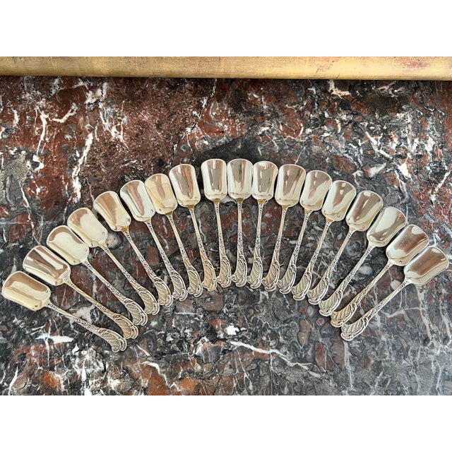 Rare service composed of 18 ice scoops in solid silver and vermeil from the house of odiot. The ensemble was created...