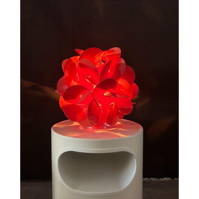 “Rose des sables” table lamp, France, circa 1968 . Table lamp with a reflector composed of interlocking red rhodoïd...