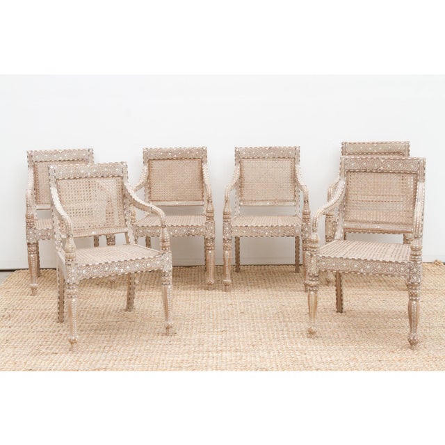 Introduce a touch of refined elegance and historical charm to your dining or living space with this set of six beautifully...