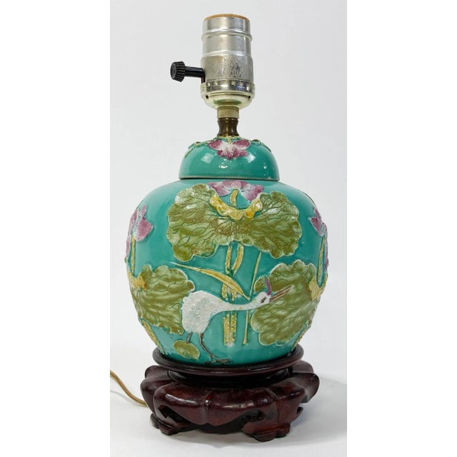 Absolutely stunning antique Chinese Wang Bing Rong turquoise green hand-cast pottery lamp featuring vibrant flora and...