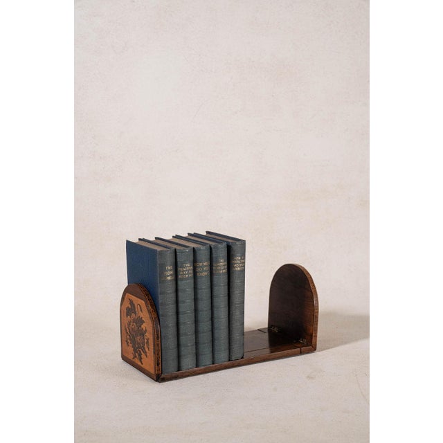 Staffordshire ware book slide featuring blue and white transferware ceramic panels within an adjustable wood frame....