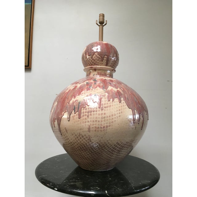 An extraordinary and highly sculptural postmodern ceramic table lamp acquired from a notable Palm Springs estate,...