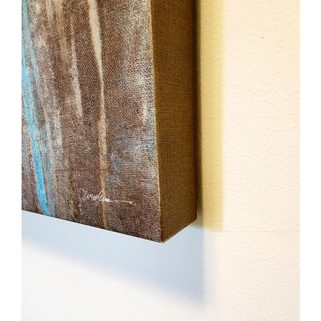 Abstract art that resembles a waterfall with colors of rust, smog and aqua water. Gives way to the feeling of aging copper...