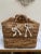 Large earthy rustic natural woven decor and storage basket with rugged side handles and rope bow accents. Perfect for...