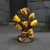 The Antique Cast Iron Yellow Tulip Flower Bouquet Doorstop is a vintage door stop made of cast iron, featuring a beautiful...