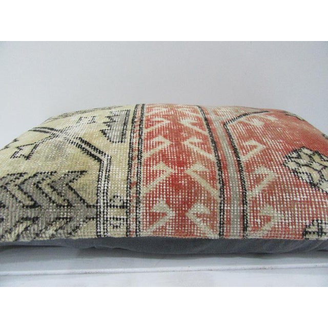 This is a pillow cover made from a vintage kilim rug. The piece was properly washed and ready to use. Pillow inserts not...