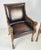 Neoclassical Pair of Theodore Alexander Regency Style Carved Lion & Hairy Paw Caster Armchairs in Brown Leather For Sale - Image 3 of 17