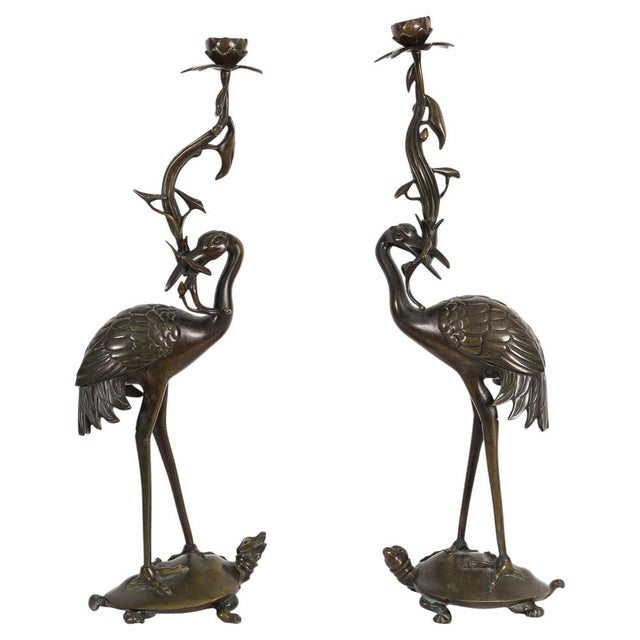 A delightful pair of Antique Japanese bronze crane figural pricket candlesticks, dating from the mid-19th century. There...
