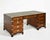 So handsome! Classic, substantial, and beautifully detailed, this mid-century English campaign partner desk brings...