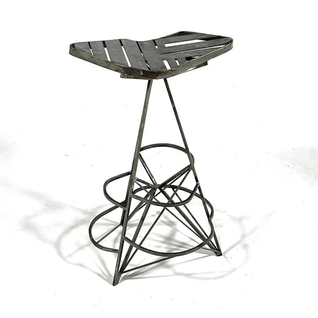 Equal parts sculpture and functional object, this stool by Branford, CT artist Val Kropiwnicki shows his use of positive...