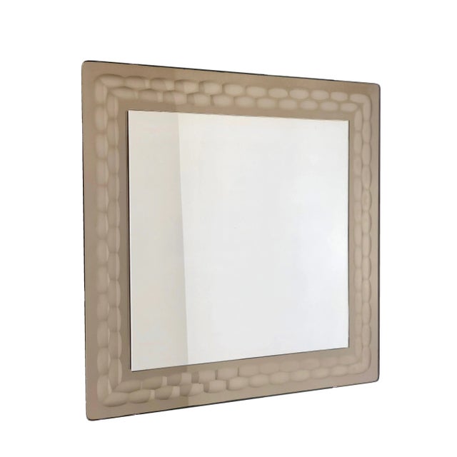 Square wall mirror by the Italian designer Antonio Lupi for crystal Luxor - Italy circa 1960. Its original label can be...