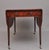 A large early 19th Century inlaid mahogany Pembroke table, having a wonderful figured and crossbanded top and extends to...