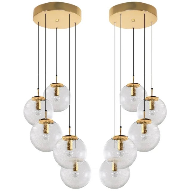 1 of 4 absolutely amazing huge ceiling mount pendant light fixtures with five globes or spheres by Limburg Glashütte. With...
