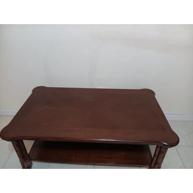 Tommy Bahama Style coffee table rectangular dark tone Style: Tropical Color: Brown Dimensions: 47" W x 18" H x 27"1/2 D