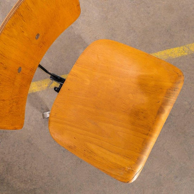 Classic Czech machinists chair used throughout Eastern Europe. Solid heavy base with birch seat and back. The chair...