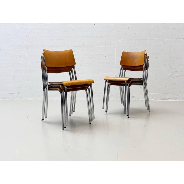 The stackable forum ii chair comes from horgenglarus, one of switzerland's oldest and most renowned furniture...