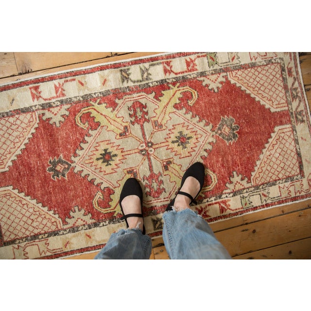 :: Diamond shaped center medallion with double quatrefoil staggered blossom features, one in a scrolled serrated leaf and...