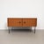 Belgian vintage lowboard by mdk, dating from the 1960s. the cabinet is crafted in teak and features two front doors with...