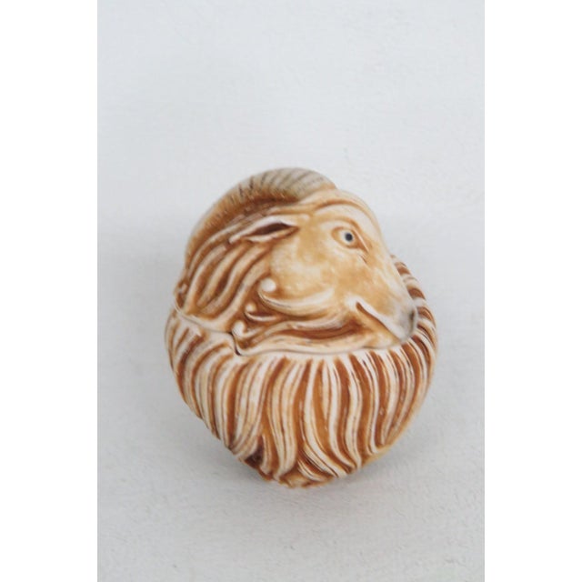 This lovely Box Figurine is made out of crushed marble and polymer resin. This beautiful figurine is carved to resemble a...