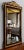 Art Nouveau mirror presenting a Beveled Mercury Glass surrounded by a molded and two-tone frame. Its mahogany color brings...