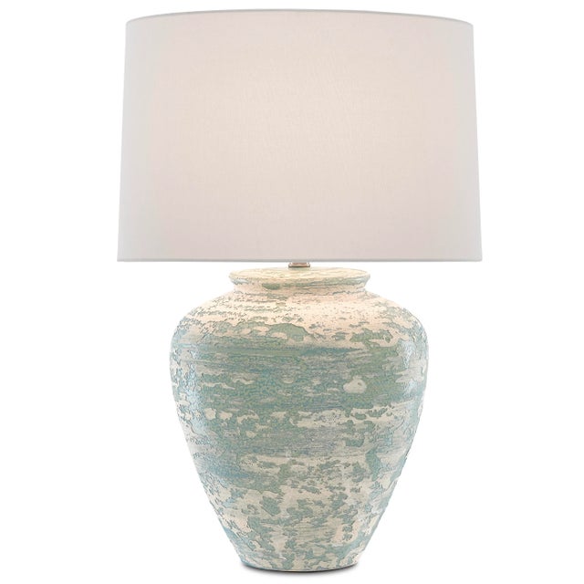 The ginger-jar shape of the Mimi Table Lamp is just one of its lovely features: the aqua and cream surface is another. The...