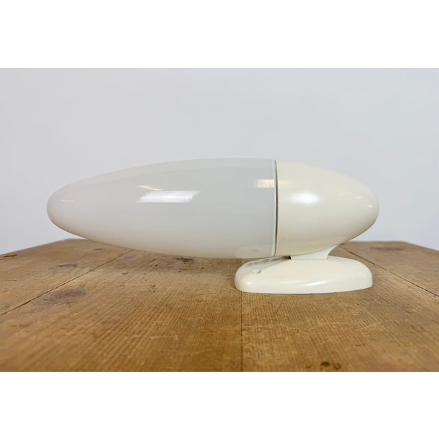 Vintage industrial white bakelite wall lamp made by Elektrosvit ( model 13702 ) in former Czechoslovakia during the 1950s....
